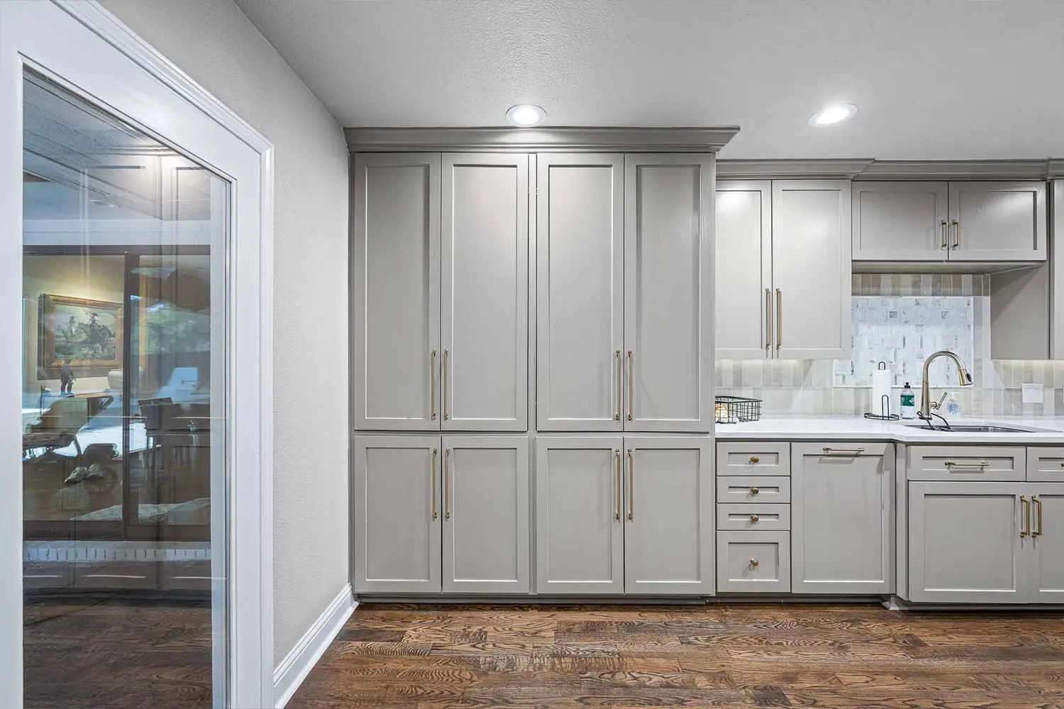 After a Dallas kitchen was remodeled, showing sleek modern cabinetry